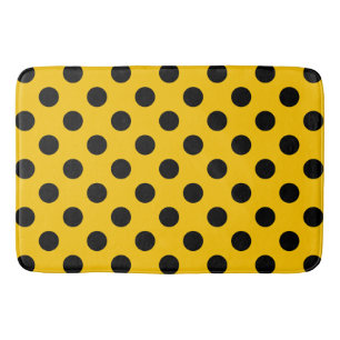 Schwarze Polka-Punkte auf Gelb Badematte