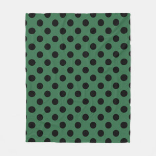 Schwarze Polka-Punkte auf kelgrün Fleecedecke