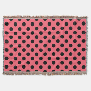 Schwarze Polka Punkte auf Korallen Decke