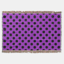 Schwarze Polka Punkte auf lila Decke