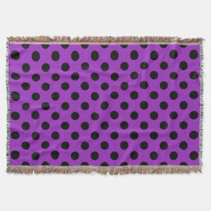 Schwarze Polka Punkte auf lila Decke