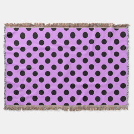 Schwarze Polka-Punkte auf Lila Decke