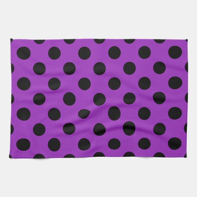 Schwarze Polka Punkte auf lila Handtuch (Horizontal)