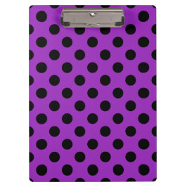 Schwarze Polka Punkte auf lila Klemmbrett
