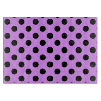 Schwarze Polka-Punkte auf Lila