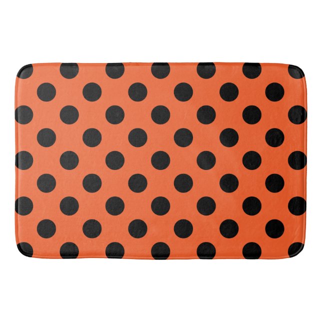 Schwarze Polka-Punkte auf Orange Badematte (Vorderseite)
