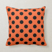 Schwarze Polka-Punkte auf Orange