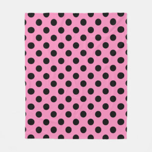 Schwarze Polka-Punkte auf Rosa Fleecedecke