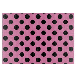 Schwarze Polka-Punkte auf Rosa Schneidebrett