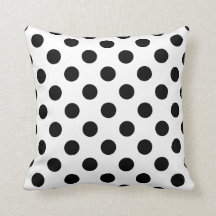 Schwarze Polka Punkte auf weiß