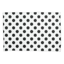 Schwarze Polka Punkte auf weiß