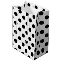 Schwarze Polka Punkte auf weiß