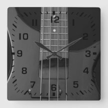Schwarze quadratische Zahlen auf Bass-Gitarre
