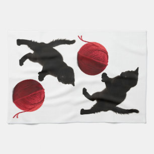 Schwarze Silhouette Kitty mit rotem Wollball Geschirrtuch