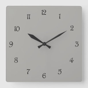 Schwarze Skriptnummern auf grauem Wccn Quadratische Wanduhr