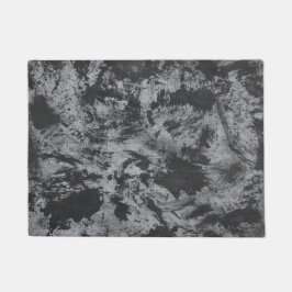 Schwarze Tinte auf grauem Hintergrund Fußmatte