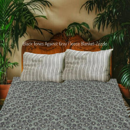 Schwarze Töne gegen Grau Fleecedecke