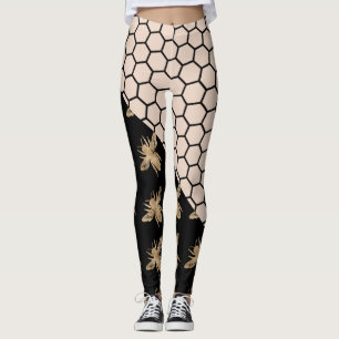 Schwarze und goldene Bienen und rosa Honigwaben Leggings