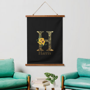 Schwarze und goldene Buchstaben H Sonnenblumen Wandteppich Mit Holzrahmen