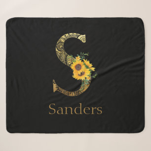 Schwarze und goldene Buchstaben S Sonnenblumen Sherpadecke