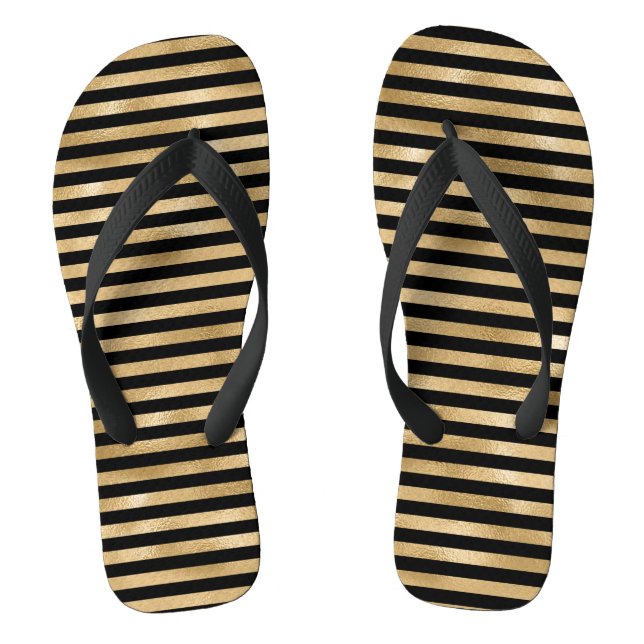 Schwarze und goldene Girls-Paare von Flip Flops (Fußbett)