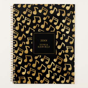 Schwarze und goldene Musiknoten Planer