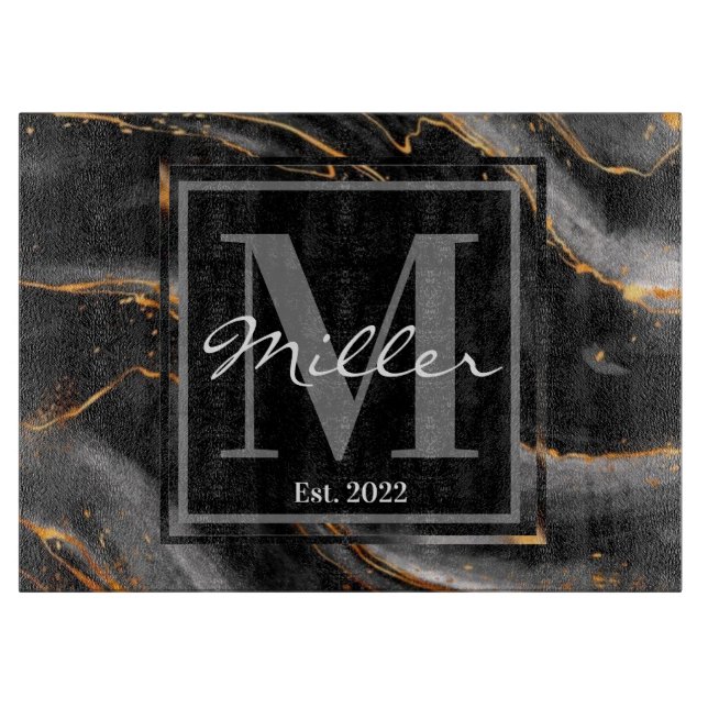 Schwarze und goldmarmorierte, frisch gezogene Häus Schneidebrett (Vorderseite)