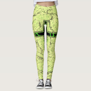 SCHWARZE UND GRÜNE KREUZEN MIT MARKE LEGGINGS