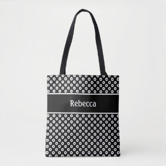 Schwarze und weiße gepunktete Tasche mit Namensstr