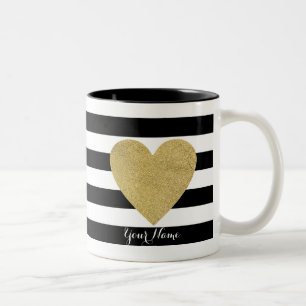 Schwarze und weiße Streifen mit goldfarbenem Herz Zweifarbige Tasse