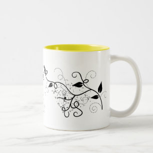 Schwarze und weiße Vektor-Efeu-Swirlsilhouette Zweifarbige Tasse