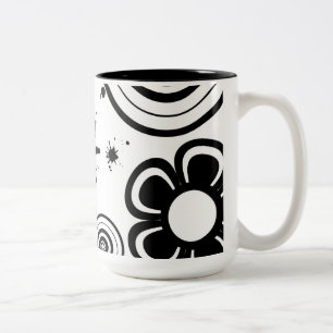 Schwarze und weiße wunderliche Blumen, Kreise, Spr Zweifarbige Tasse