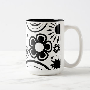 Schwarze und weiße wunderliche Blumen, Kreise, Spr Zweifarbige Tasse