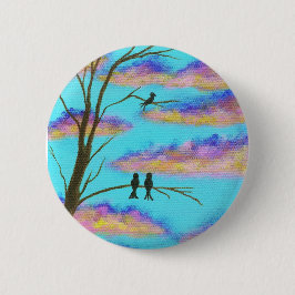 Schwarze Vögel auf Ast-bunter Wolken-Himmel-Kunst Button