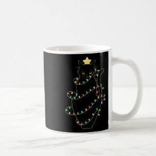 Schwarze Weihnachtsmann-Katze in Weihnachtsbaumlic Kaffeetasse