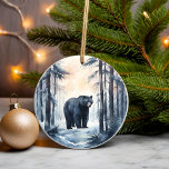 Schwarzer Bär bei Waldtieren im Winter Keramik Ornament<br><div class="desc">Schöner schwarzer Bär in einem schneebedeckten Winterwald Wunderland. Hübsches Aquarellbild. Ideal für eine Hütte oder Weihnachtsfeiertage Waldthema.</div>