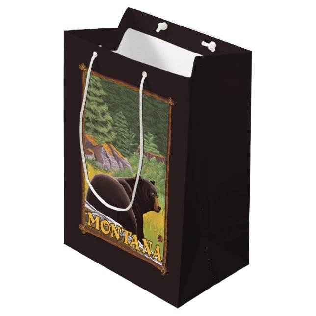Schwarzer Bär im Wald - Montana Mittlere Geschenktüte (Vorderseite Schrägansicht)