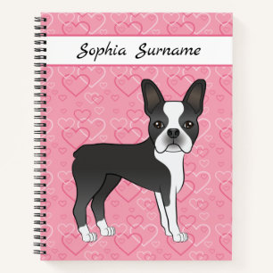 Schwarzer Boston Terrier Hund auf rosa Herzen und  Notizbuch