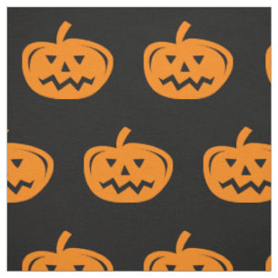 Schwarzer Halloween-Stoff mit geschnitzten orangen Stoff