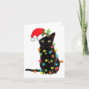 Schwarzer Katzen-Weihnachtsmann, verheddert in Wei Karte