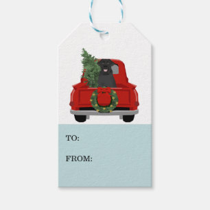 Schwarzer Labrador Weihnachtshund Roter LKW Geschenkanhänger