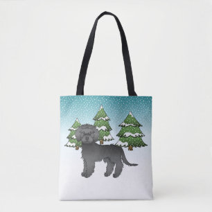 Schwarzer Mini Goldendoodle Hund in einem Winterwa Tasche