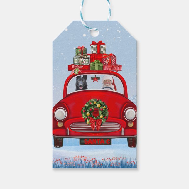 Schwarzer Schäferhund in Auto mit dem Weihnachtsma Geschenkanhänger (Vorderseite)