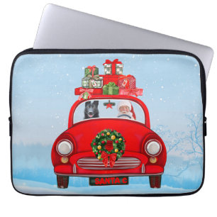Schwarzer Schäferhund in Auto mit dem Weihnachtsma Laptopschutzhülle