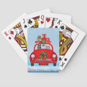Schwarzer Schäferhund in Auto mit dem Weihnachtsma Spielkarten