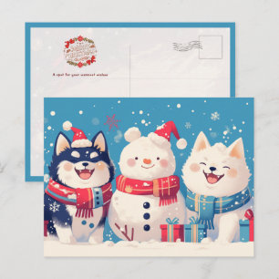 Schwarzer Shiba Inu und Samoyed-Hund mit Schneeman Postkarte