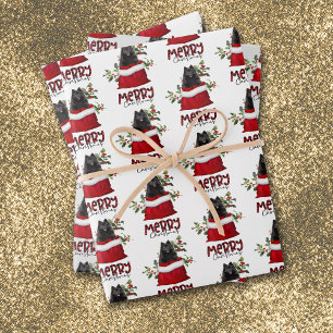 Schwarzer Spitz in der Weihnachtsgeschenktasche Geschenkpapier Set