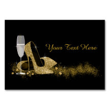 Schwarzer und goldener High Heel Schuh