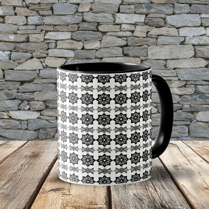 Schwarzes, blättriges florales Achteck- und Diagon Tasse