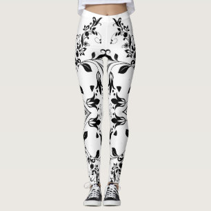 Schwarzes Blumenmuster über das Workout der weißen Leggings